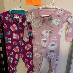 Two Zip up onesies 6-9 months girl